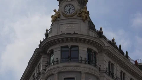 Clock tower of the Capitol Building (Edificio Carrión) on Gran Vía in Madrid Stock Footage 334505838