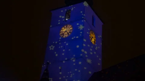 Clock tower with christmas light projection show Stock Footage 332167489