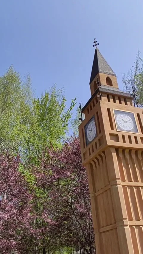 The Clock Tower in the city has a clock and is made of wood Stock Footage 272227332