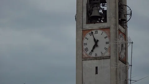 Clock tower with clock-face and bell in old Italy city, bad weather Stock Footage 92694735