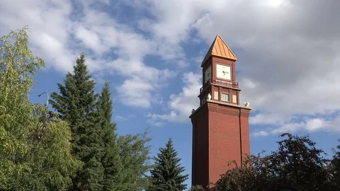 Clock Tower with Clouds Rolling in St. Albert Stock Footage 114665389
