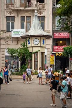 Clock tower at crowded Market Square in Buyukada island, one of Princes' Islands Stock Photos