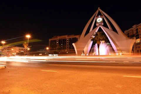 Clock tower dubai at night Stock Photos
