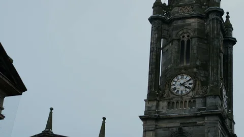 A clock tower in Edinburgh Stock Footage 128275961