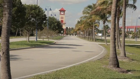 Clock Tower at the End of a Road Stock Footage 102128407