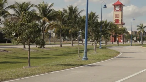 Clock Tower at the End of a Road Stock Footage 102128549