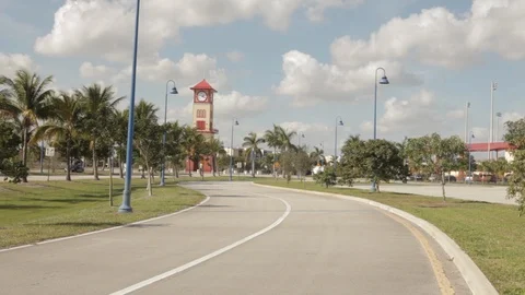 Clock Tower at the End of a Road Stock Footage 102128628