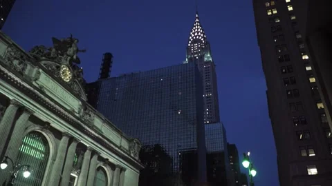 A clock tower in front of a building Stock Footage 155585992