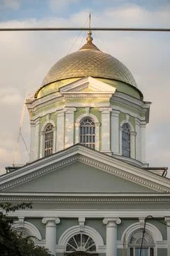 A clock tower in front of a building Stock Photos
