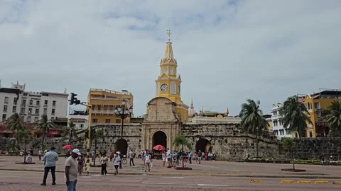 Clock Tower Gate and Plaza on Partly Cloudy Day, Cartagena, Colombia 8K Video stock 331501512