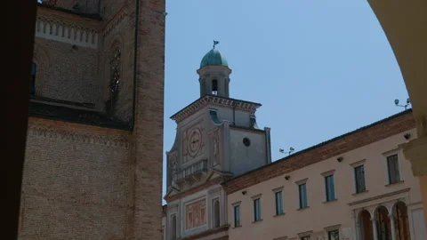 Clock tower historic palace square framed handheld pan shot Stock Footage 342652104