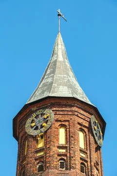 Clock on the tower of the Kaliningrad Cathedral Stock Photos