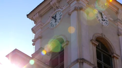 Clock tower with lightleaks Stock Footage 76442207