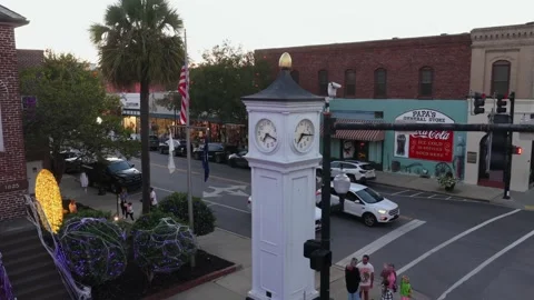 Clock Tower on a Main Street Corner at Dusk, Conway 스톡 동영상 347702212
