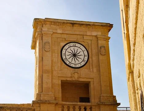 Clock on a tower in Malta Stock Photos