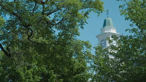 Clock Tower in New England Town, Blue Sky in Summer Stock Footage 310694790