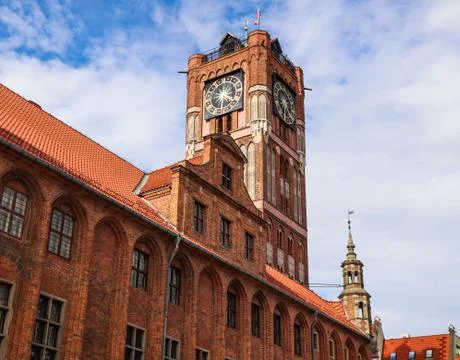 Clock Tower of Old Town Hall (Ratusz Staromiejski) in Torun, Poland. August 2 Stock Photos