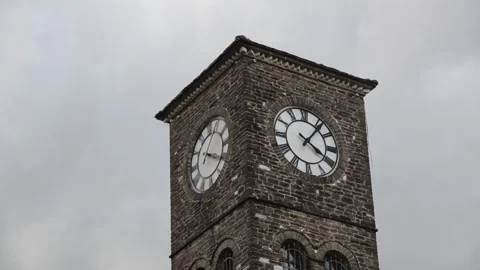 Clock tower in old town. Historical building.  Gjirokastra castle, Albania. Video stock 143497452