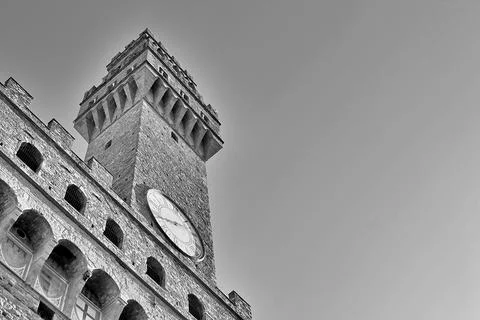 Clock tower of Palazzo Vecchio rises high above Florence, Italy Stock Photos