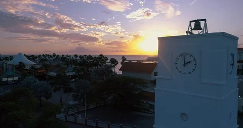 Clock tower pan around drone shot with empty cruise ship terminal in sight Stock-Footage 128609083