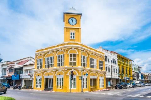 Clock tower at Phuket old town with old buildings in Sino Portuguese style Stock Photos