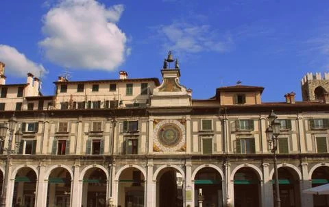 The clock tower on the Piazza della Logia in Brescia. Italy Stock Photos