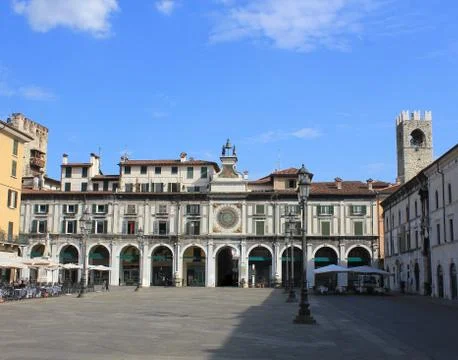 The clock tower on the Piazza della Logia in Brescia. Italy Stock Photos