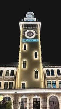 Clock tower at Rosa Khutor resort in Sochi at dusk Stock Photos