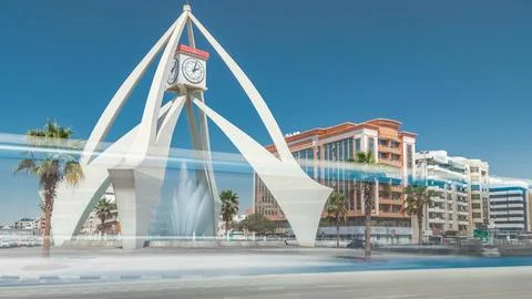 The Clock Tower Roundabout timelapse is an important junction and landmark .. Stock Photos