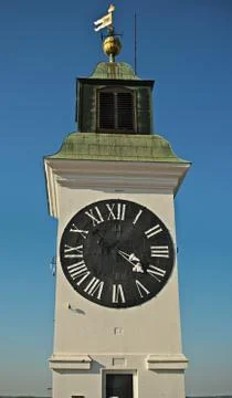 Clock tower with small bell tower at top in Novi Sad, Serbia Stock Photos