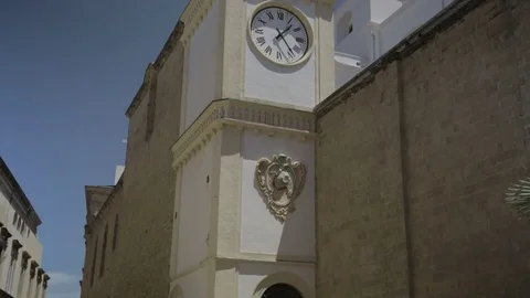 Clock tower in a small town on a beautiful day Stock Footage 71538173