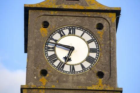 The clock tower in St Just at sunset, Cornwall, UK. Stock Photos