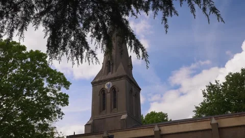 Clock Tower of St Leonard's Church Framed by Tree Branches Stock Footage 336401037