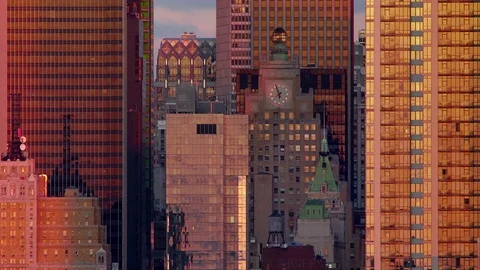 Clock tower surrounded by various New York City skyscrapers. Stock Footage 78807997
