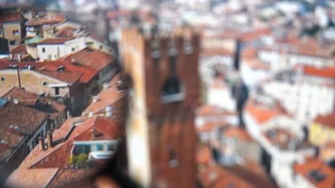 Clock Tower In Treviso concept view through magnifying glass, Veneto, Italy Stock Footage 106234603