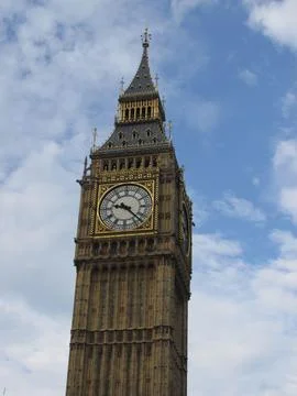 Clock Tower under a Blue Sky Stock Photos