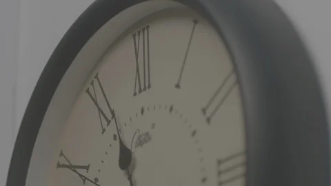 A clock on the wall close up Stock Footage