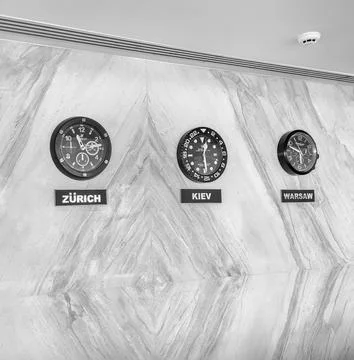 The clock on the wall in the hotel Stock Photos