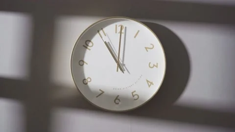 The clock on the wall showed 11:00. Stock Footage 162657009