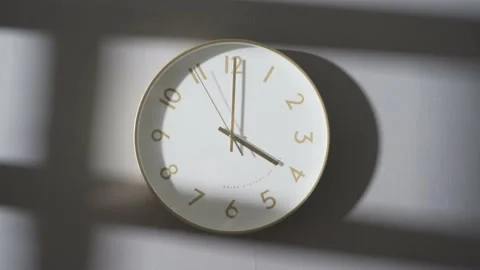 The clock on the wall showed 4:00. Stock Footage 162656178