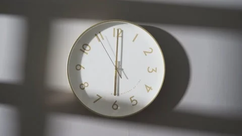 The clock on the wall showed 6:00. Stock Footage 162656415