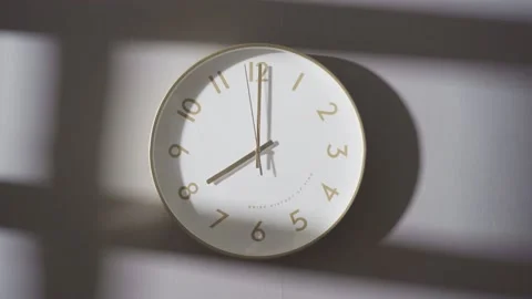 The clock on the wall showed 8:00. Stock Footage 162656527