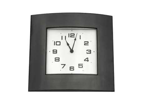 Clock on the wall. Time concept. Five to twelve, it's  almost late Stock Photos
