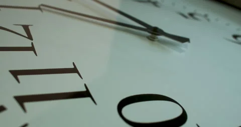 On the clock, we see a round dial with numerical markings or hour 스톡 동영상 241983166