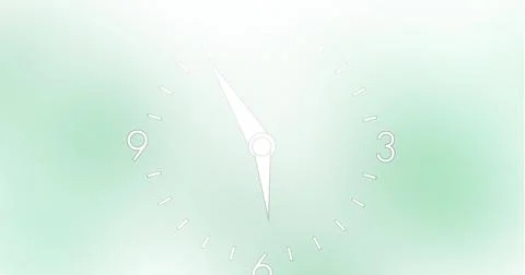 Clock with white hands and numbers on soft green background showing 10:10 Stock Photos