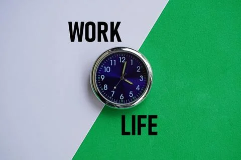 Clock with the word WORK LIFE. Concept of employment 스톡 사진