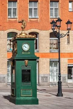 Clock in the yard. Stock Photos