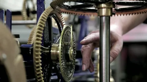 Clockmaker Adjusting Antique Turret Clock Gears and Mechanism 库存影片 345753509