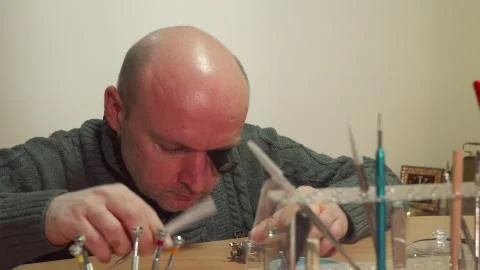 Clockmaker begins his work Stock Photos