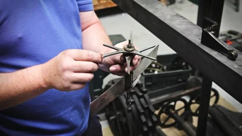Clockmaker Inspecting Antique Clockwork Mechanism Component Stock Footage 345750266